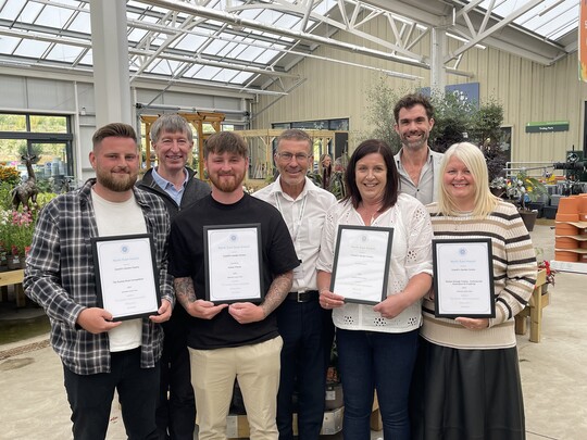 Staff at Cowells Garden Centre with their awards including one for North East Garden Centre of the Year in the Destination Garden Centre (DGC) category with (back row L-R) GCA CEO Peter Burks, GCA Inspector, Colin Farquahar and Area Chairman, Justin Williams.