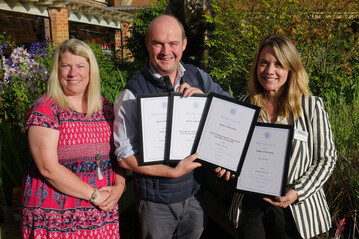 Left to right: Area Chairman, Helen Lloyd, Ed Webb, owner, and Sarah Brooks, Head of Brand & Digital from Webbs of Wychbold, which was the winner of Garden Centre of the Year in the Destination Garden Centre (DGC) category, with all their awards.