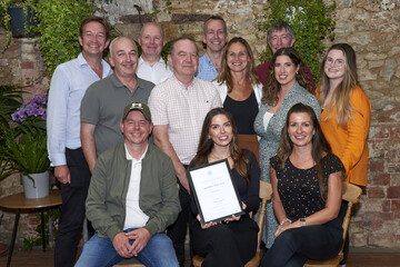 The team at Ruxley Manor Garden Centre with their award for Garden Centre of the Year in the Destination Garden Centre (DGC) category with GCA CEO Peter Burks (back right), and South Thames Area Chairman James Evans (back middle) and GCA Inspector Gordon Emslie (back second left).