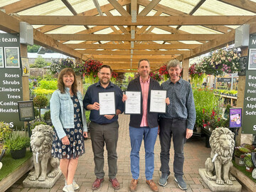 Matthew Bailey (right), General Manager at Mortonhall Garden Centre, which was awarded Garden Centre of the Year in the Destination Garden Centre (DGC) category for Scotland with GCA Inspector, Alyson Haywood (far left) and GCA CEO, Peter Burks (far right).