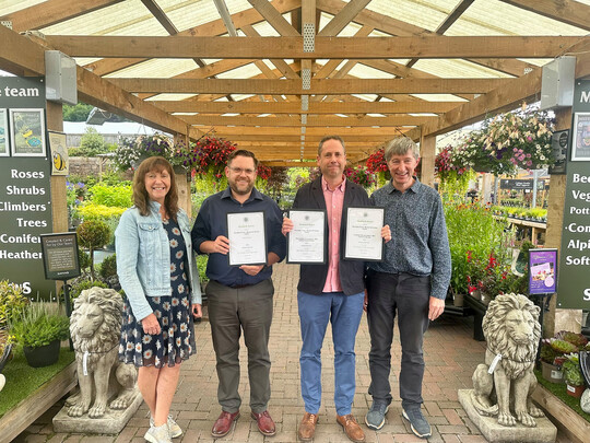 Matthew Bailey (right), General Manager at Mortonhall Garden Centre, which was awarded Garden Centre of the Year in the Destination Garden Centre (DGC) category for Scotland with GCA Inspector, Alyson Haywood (far left) and GCA CEO, Peter Burks (far right).