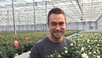 Anders Eskelund in his greenhouses with the first Infinity roses 2009